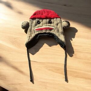 SOCK MONKEY EARFLAP WINTER HAT WITH RED CAP DESIGN